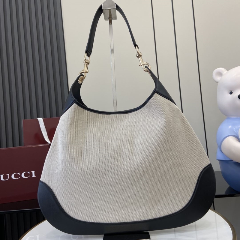 G*u*i top handle bags